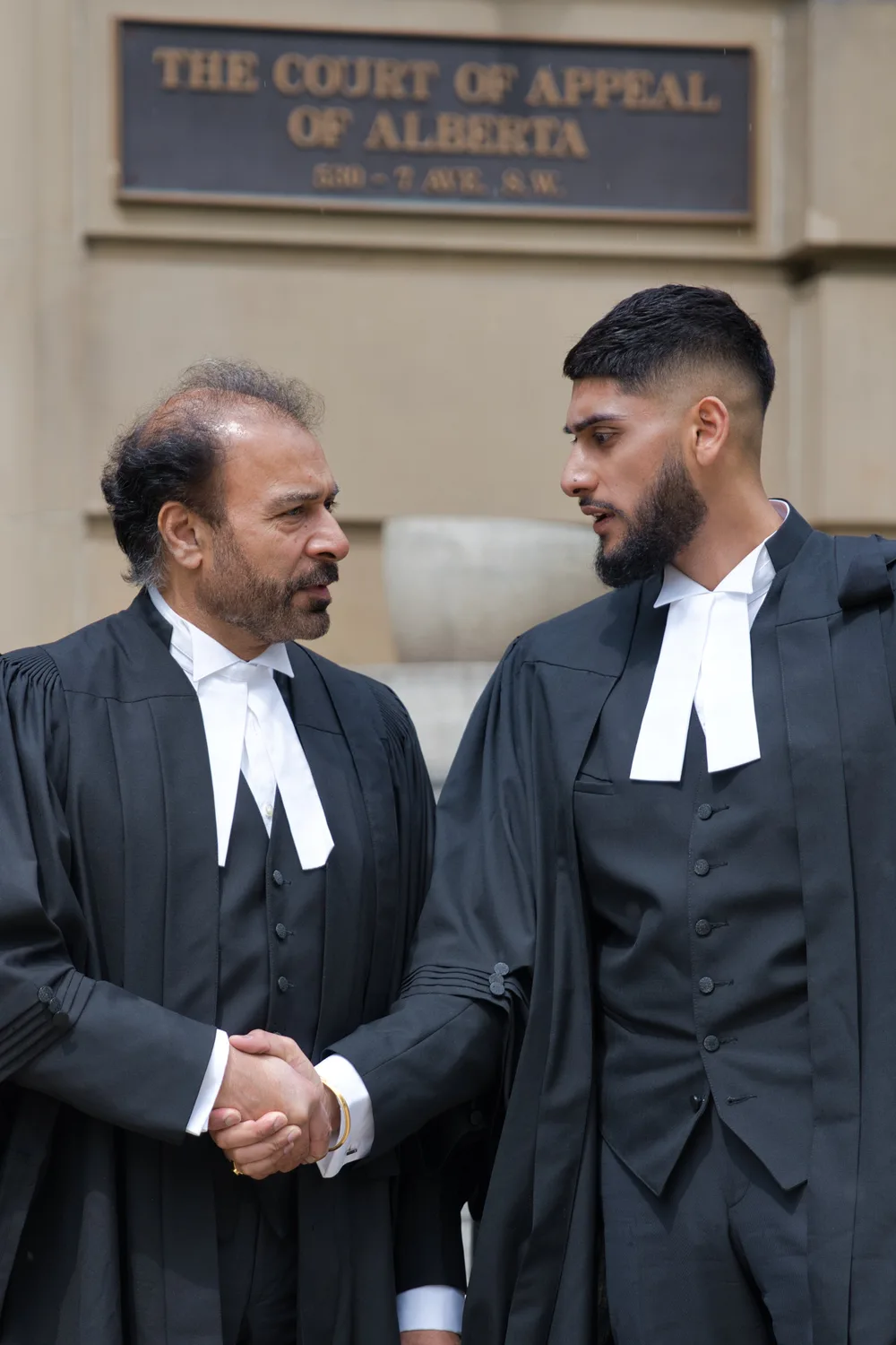 Rob and Rohan Bagga together outside the Court of Appeal of Alberta